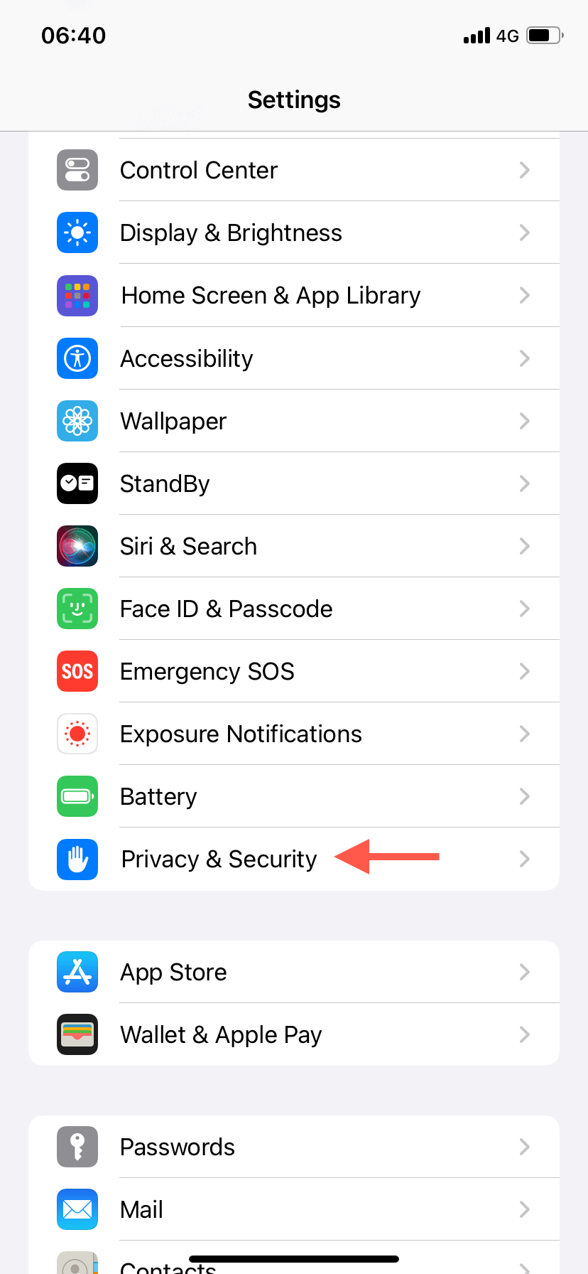 The iPhone's Settings app with the Privacy & Security option highlighted.