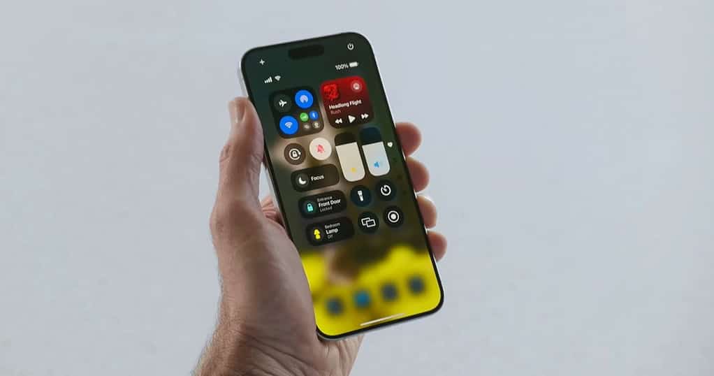 iPhone running iOS 18 showing the Quick Settings menu
